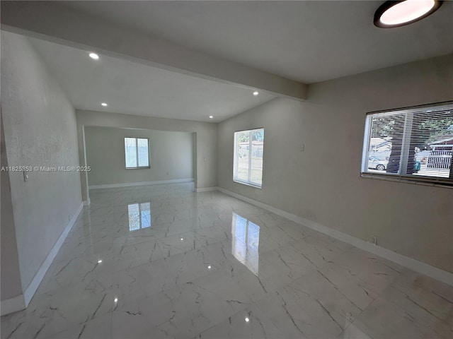 3231 NW 48th Ter, Miami, FL 33142 - spare room featuring recessed lighting and light marble finish flooring