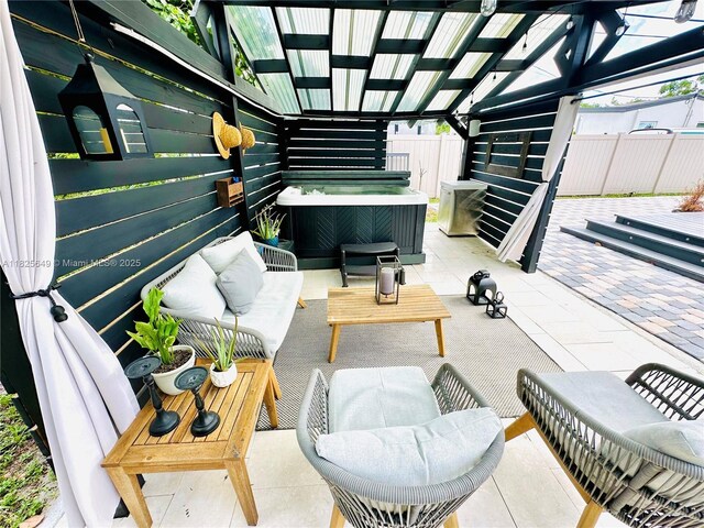 305 SW 24th Ave, Fort Lauderdale, FL 33312 - fenced backyard featuring outdoor lounge area, a patio, and a hot tub