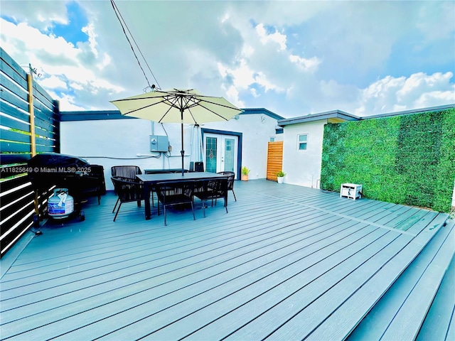 305 SW 24th Ave, Fort Lauderdale, FL 33312 - wooden deck with french doors, outdoor dining area, and a grill