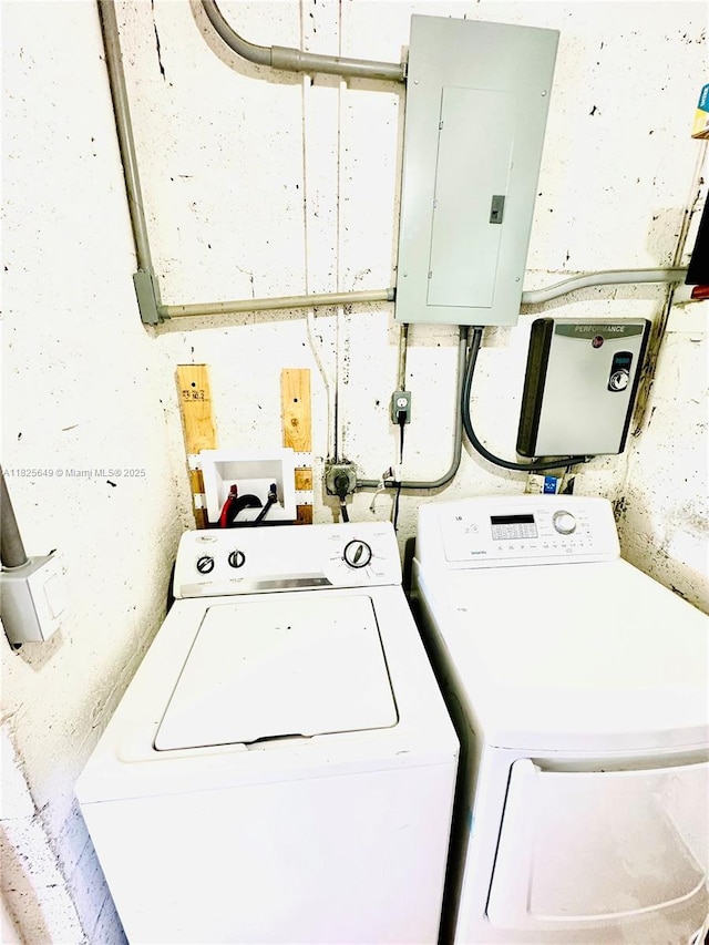 305 SW 24th Ave, Fort Lauderdale, FL 33312 - laundry area with electric panel and washer and dryer