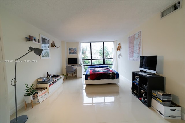 1450 Brickell Bay Dr Unit 311, Miami, FL 33131 - bedroom featuring tile patterned flooring