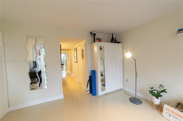 1450 Brickell Bay Dr Unit 311, Miami, FL 33131 - hallway featuring baseboards