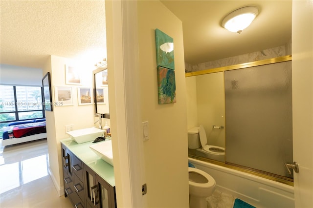 1450 Brickell Bay Dr Unit 311, Miami, FL 33131 - bathroom with double vanity, bath / shower combo with glass door, tile patterned flooring, and ensuite bathroom