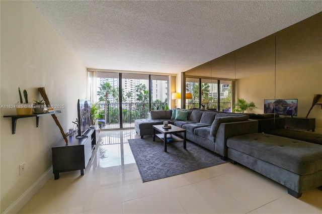 1450 Brickell Bay Dr Unit 311, Miami, FL 33131 - living room with floor to ceiling windows, a textured ceiling, and light tile patterned flooring