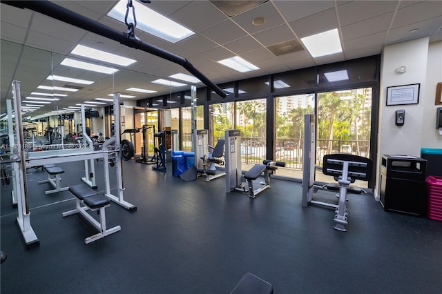 1450 Brickell Bay Dr Unit 311, Miami, FL 33131 - gym with a paneled ceiling