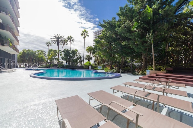 1450 Brickell Bay Dr Unit 311, Miami, FL 33131 - community pool featuring a patio