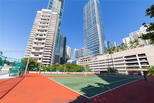 1450 Brickell Bay Dr Unit 311, Miami, FL 33131 - view of tennis court featuring a view of city
