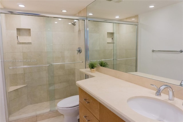 3 Grove Isle Dr Unit C1405, Miami, FL 33133 - bathroom with recessed lighting, vanity, and a stall shower