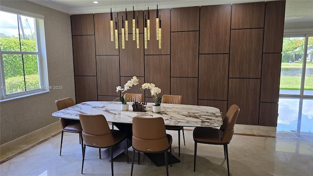 1425 Crossbill Ct, Weston, FL 33327 - dining area with light marble finish flooring, a textured wall, ornamental molding, and recessed lighting