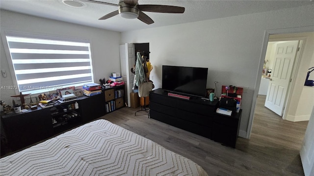 1425 Crossbill Ct, Weston, FL 33327 - bedroom with wood finished floors and ceiling fan