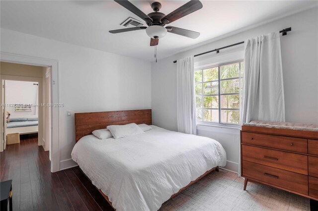 1210 Genoa St, Coral Gables, FL 33134 - bedroom with wood finished floors and ceiling fan