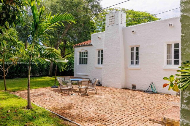 1210 Genoa St, Coral Gables, FL 33134 - view of patio / terrace with outdoor dining area