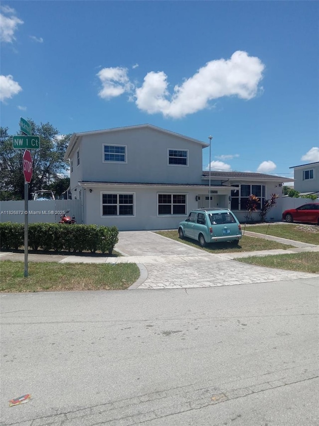 7400 NW 1st Ct, Pembroke Pines, FL 33024 - view of front facade featuring driveway and stucco siding