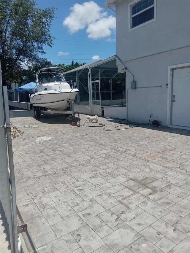 7400 NW 1st Ct, Pembroke Pines, FL 33024 - view of patio / terrace with a sunroom