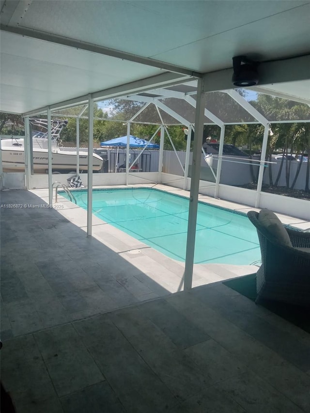 7400 NW 1st Ct, Pembroke Pines, FL 33024 - view of pool with a fenced backyard, a lanai, and a patio