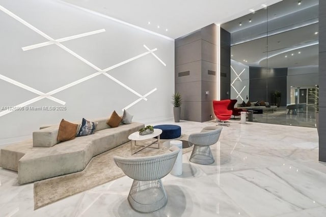 3300 NE 192nd St Unit 1707, Aventura, FL 33180 - living area with marble tiled floors and a towering ceiling