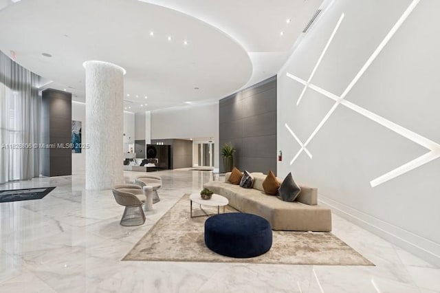 3300 NE 192nd St Unit 1707, Aventura, FL 33180 - living area with light marble finish floors and decorative columns