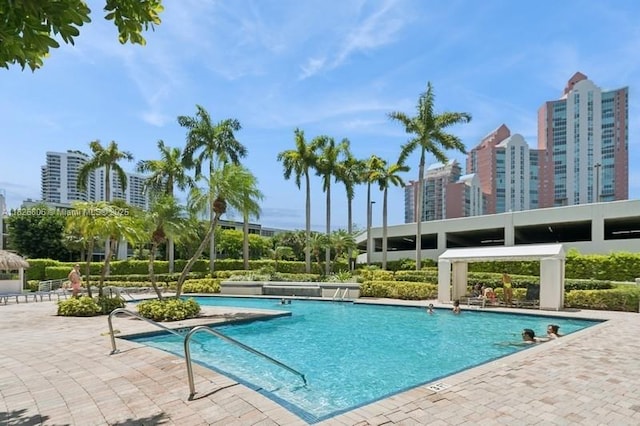 3300 NE 192nd St Unit 1707, Aventura, FL 33180 - community pool with a patio and a view of city
