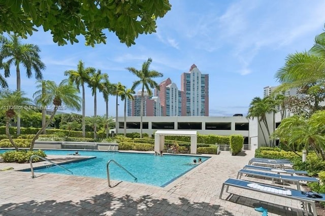 3300 NE 192nd St Unit 1707, Aventura, FL 33180 - community pool with a patio and a view of city