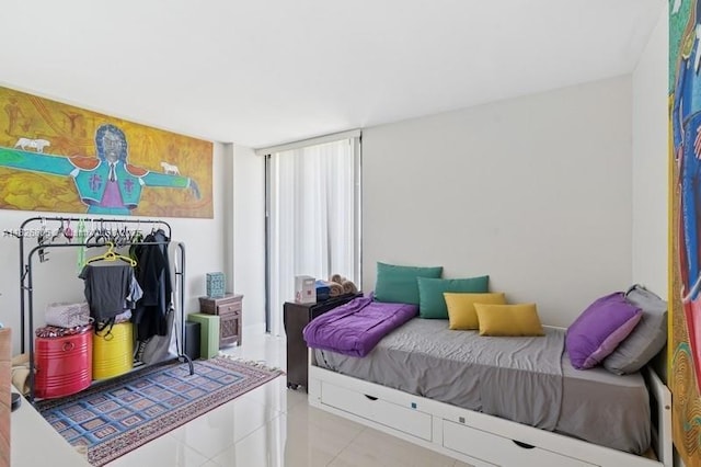 3300 NE 192nd St Unit 1707, Aventura, FL 33180 - bedroom featuring light tile patterned floors