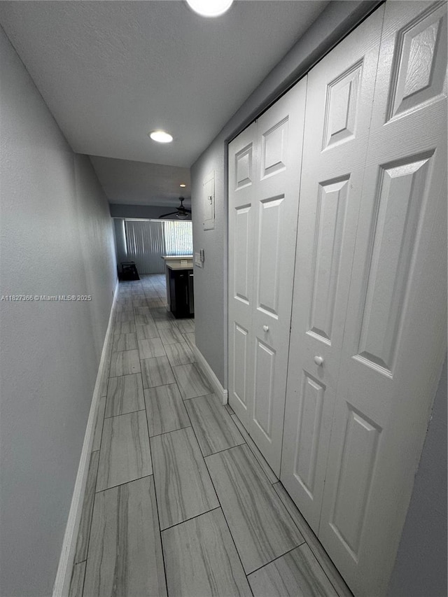 9500 SW 3rd St Unit 239, Boca Raton, FL 33428 - corridor featuring baseboards and recessed lighting
