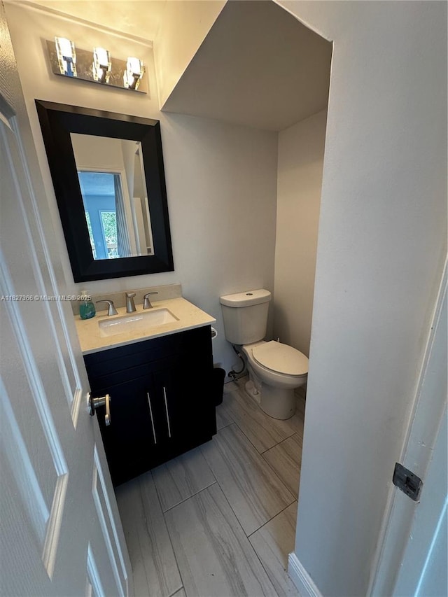9500 SW 3rd St Unit 239, Boca Raton, FL 33428 - half bathroom with vanity and toilet