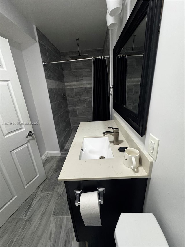 9500 SW 3rd St Unit 239, Boca Raton, FL 33428 - bathroom with vanity and tiled shower