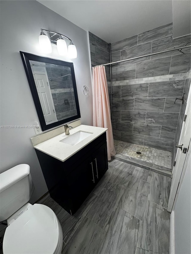 9500 SW 3rd St Unit 239, Boca Raton, FL 33428 - bathroom with vanity and tiled shower