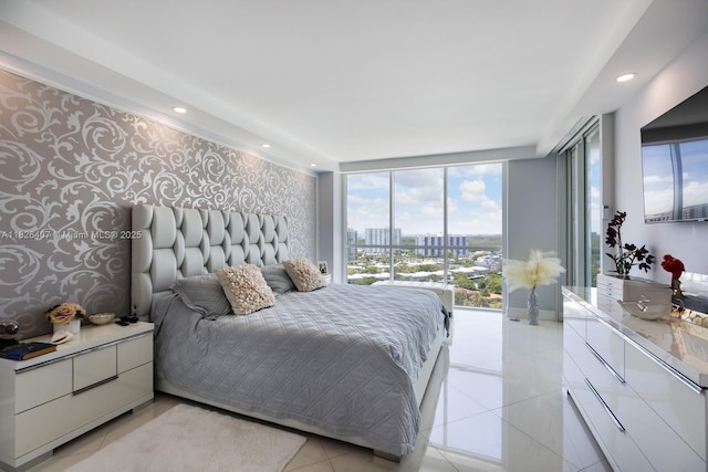 16400 Collins Ave Unit 1845, Sunny Isles Beach, FL 33160 - bedroom with wallpapered walls, multiple windows, recessed lighting, expansive windows, and an accent wall