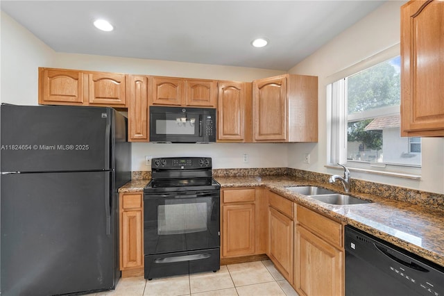 1817 NW 54th Ter Unit Bb4, Lauderhill, FL 33313 - kitchen with black appliances, dark stone countertops, light tile patterned floors, and recessed lighting