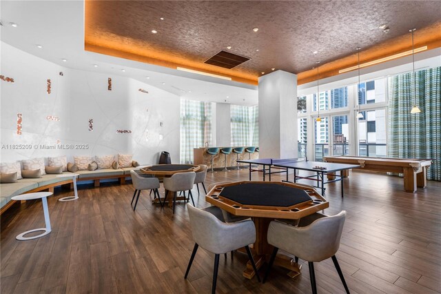 50 Biscayne Blvd Unit 3002, Miami, FL 33132 - game room with a raised ceiling, wood finished floors, a community bar, recessed lighting, and floor to ceiling windows