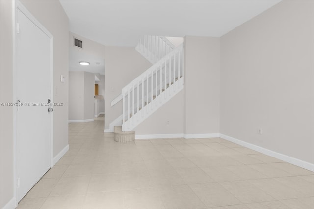 8122 SW 119th Ct Unit 8122, Miami, FL 33183 - unfurnished room with stairs and light tile patterned floors