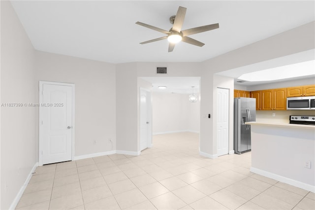 8122 SW 119th Ct Unit 8122, Miami, FL 33183 - kitchen with appliances with stainless steel finishes, ceiling fan, light countertops, and light tile patterned flooring