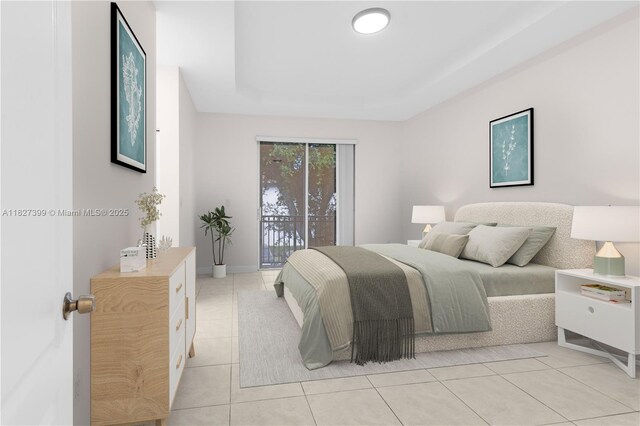 8122 SW 119th Ct Unit 8122, Miami, FL 33183 - bedroom with light tile patterned flooring, a tray ceiling, and access to outside
