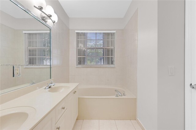 8122 SW 119th Ct Unit 8122, Miami, FL 33183 - bathroom featuring a garden tub, double vanity, and tile patterned flooring