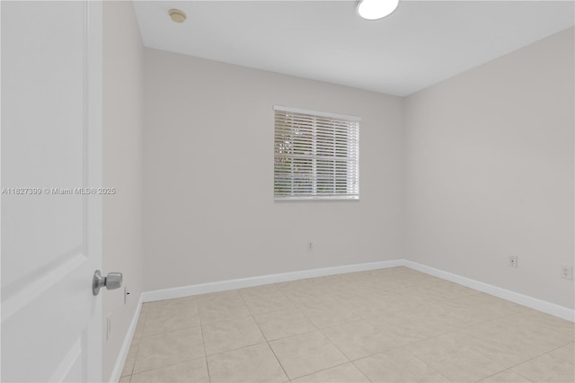 8122 SW 119th Ct Unit 8122, Miami, FL 33183 - unfurnished room with a smoke detector and light tile patterned floors