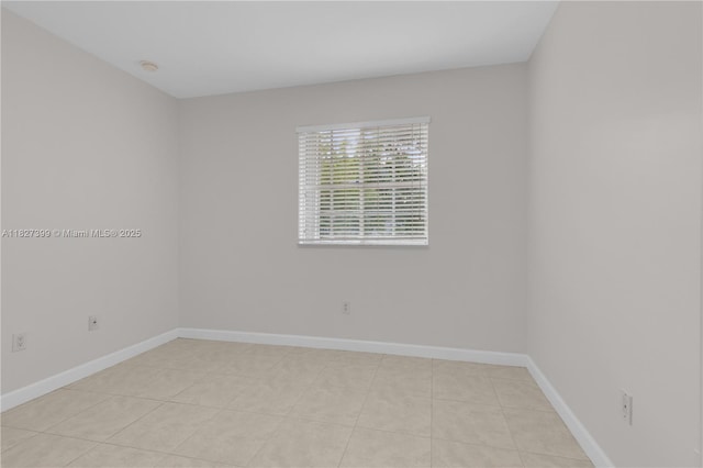 8122 SW 119th Ct Unit 8122, Miami, FL 33183 - empty room with light tile patterned floors