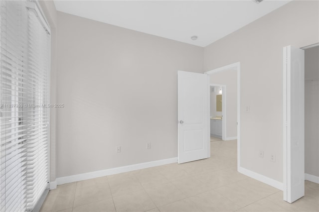 8122 SW 119th Ct Unit 8122, Miami, FL 33183 - unfurnished bedroom featuring baseboards