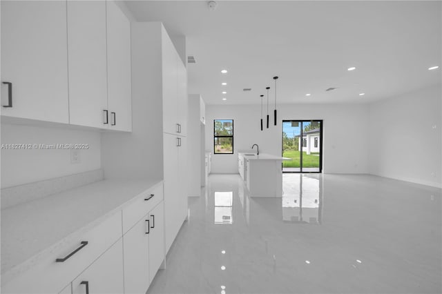 643 Knapp St, Lehigh Acres, FL 33974 - kitchen with modern cabinets, white cabinetry, light countertops, and recessed lighting