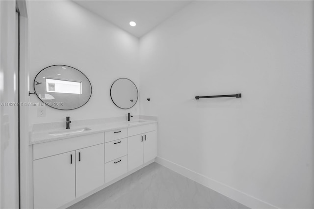 643 Knapp St, Lehigh Acres, FL 33974 - full bath with marble finish flooring, double vanity, and recessed lighting