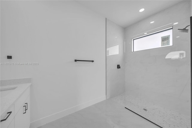 643 Knapp St, Lehigh Acres, FL 33974 - full bath with marble look tile flooring, a marble finish shower, and vanity