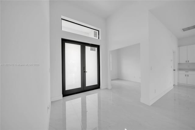 643 Knapp St, Lehigh Acres, FL 33974 - foyer with french doors and baseboards