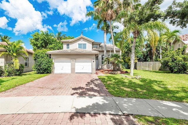 315 W Cypress Cove Cir, Davie, FL 33325 - traditional-style house featuring stucco siding, decorative driveway, an attached garage, and a tiled roof