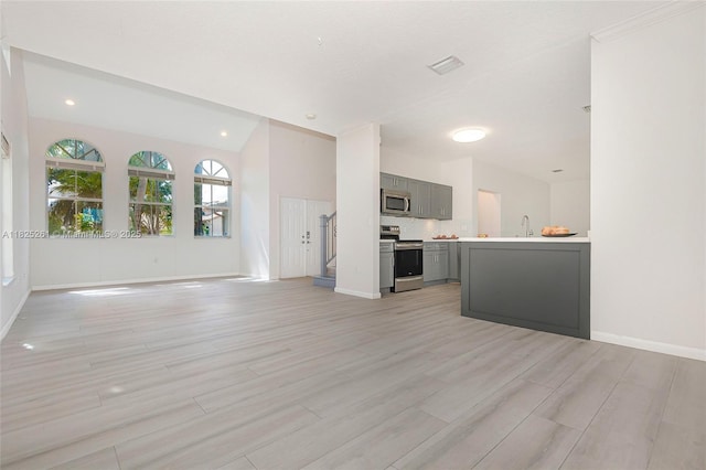 315 W Cypress Cove Cir, Davie, FL 33325 - unfurnished living room with light wood-type flooring and lofted ceiling