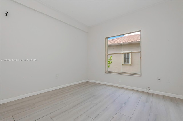 315 W Cypress Cove Cir, Davie, FL 33325 - empty room featuring baseboards and light wood finished floors