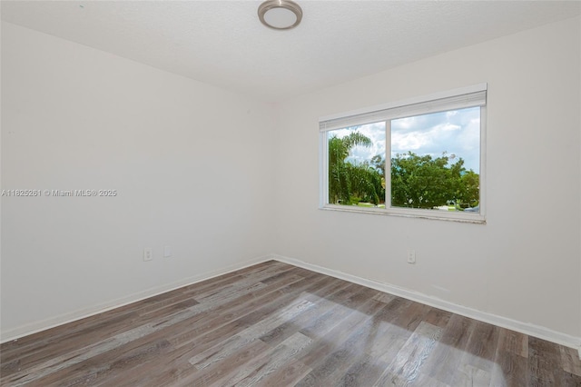315 W Cypress Cove Cir, Davie, FL 33325 - spare room featuring wood finished floors and baseboards