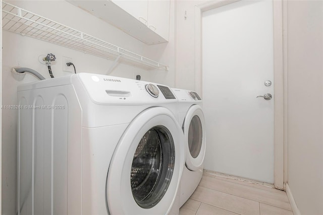 315 W Cypress Cove Cir, Davie, FL 33325 - laundry area with washer and clothes dryer and cabinet space