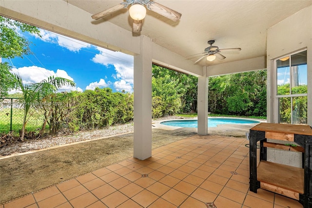 315 W Cypress Cove Cir, Davie, FL 33325 - view of patio / terrace with ceiling fan and an outdoor pool