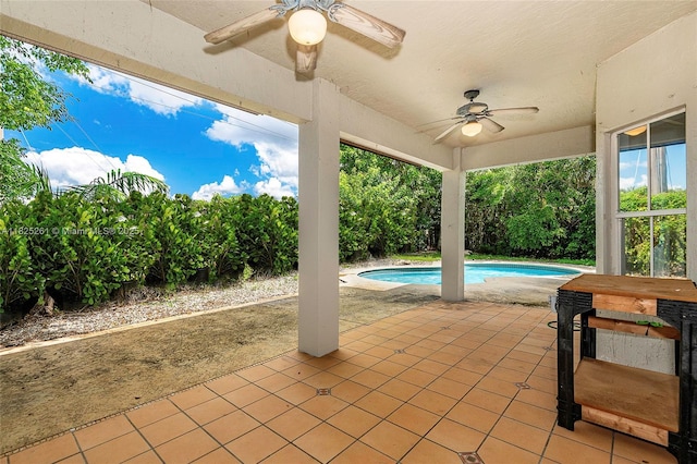 315 W Cypress Cove Cir, Davie, FL 33325 - view of patio / terrace with ceiling fan and an outdoor pool