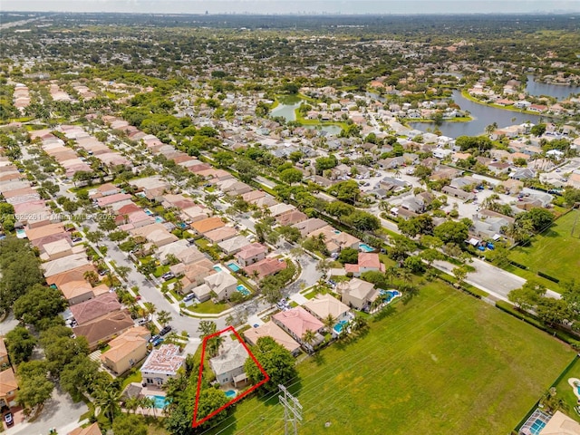 315 W Cypress Cove Cir, Davie, FL 33325 - aerial view of residential area with property parcel outlined and a nearby body of water